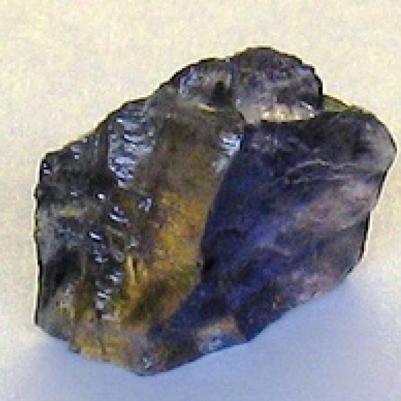 Rough Iolite crystal metaphysical properties, meanings, uses, benefits, healing energies, chakras